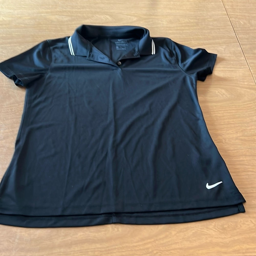 Nike women’s Dri-fit golf shirt.